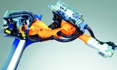 Compact unit: Kuka shelf-mounted robot with the built-in power supply unit